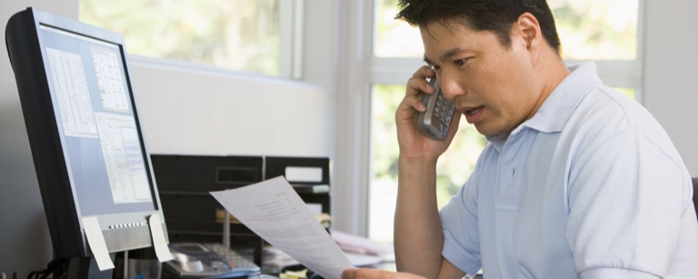Mortgage broker speaks on phone