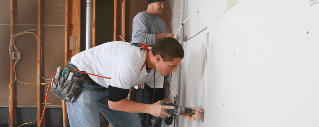 Insured contractor in Colorado installs a drywall


