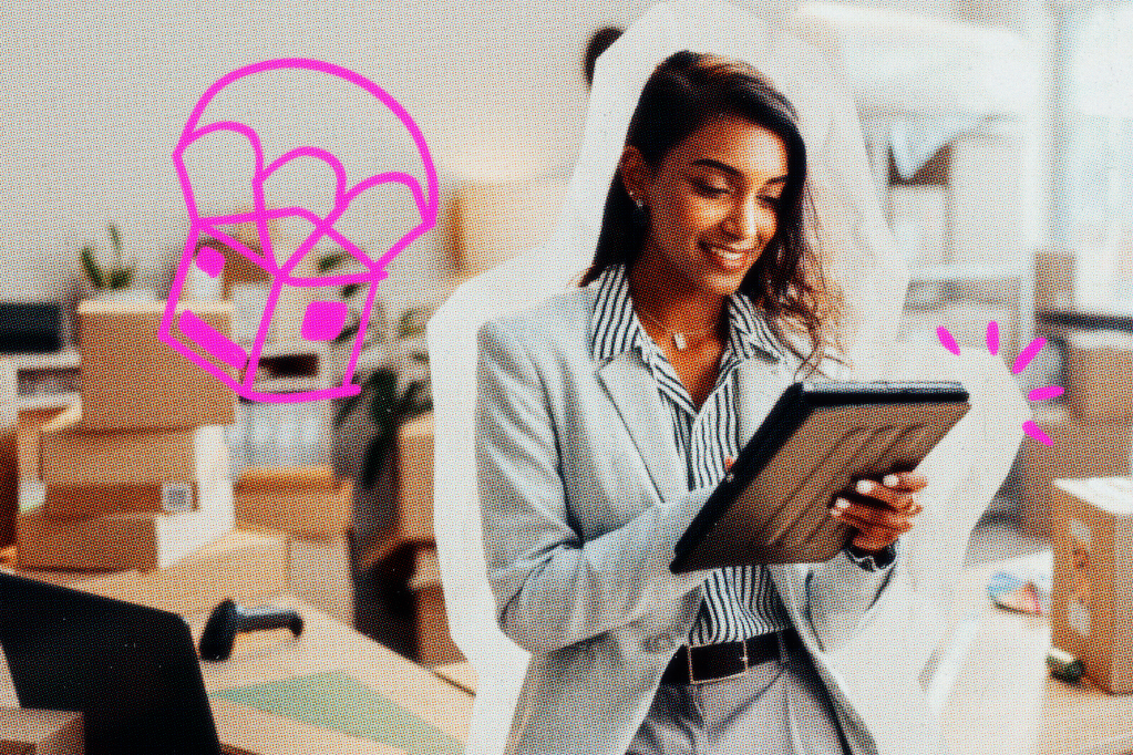 Woman is working with a tablet among boxes in a dropshipping area