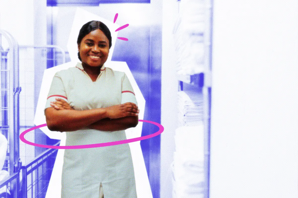 Smiling housekeeper at work.