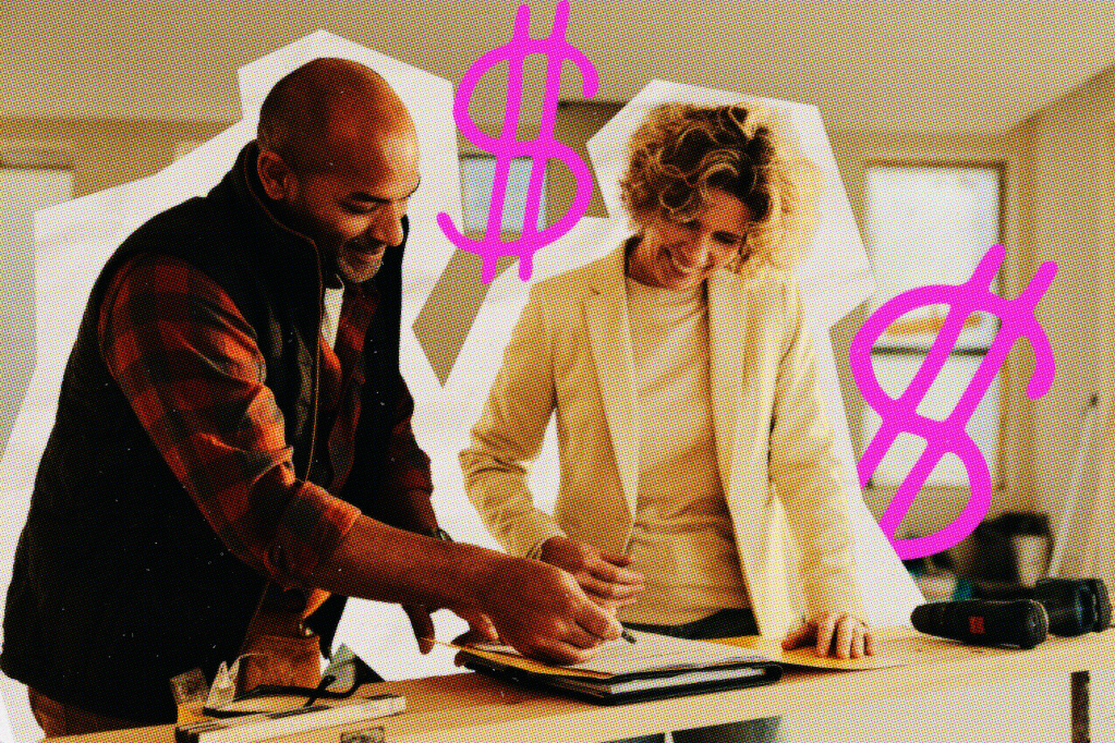 A man and a woman reviewing an insurance document.